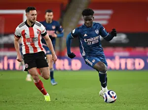Arsenal's Bukayo Saka Outwits Sheffield United's George Baldock in Empty Bramall Lane