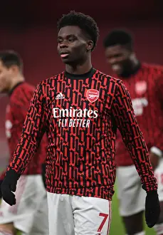 Arsenal's Bukayo Saka Prepares for Newcastle United Clash at Empty Emirates Stadium (Arsenal v Newcastle United, 2021)
