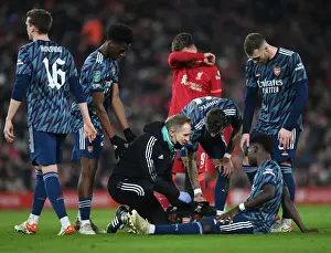 Liverpool V Arsenal Carabao Cup 21-22 Prints: Arsenal's Bukayo Saka Receives Treatment from Physio During Liverpool vs Arsenal Carabao Cup Semi-Final