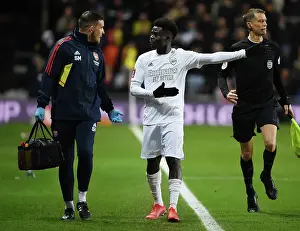 Arsenal's Bukayo Saka Receives Treatment from Physio during Oxford United FA Cup Clash