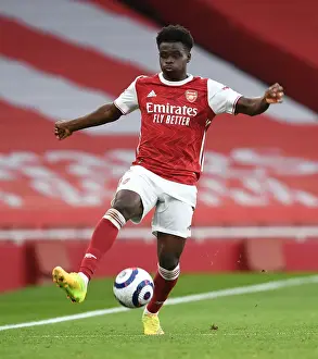 Arsenal's Bukayo Saka Shines in Empty Emirates Stadium: Arsenal vs. Tottenham, Premier League 2020-21
