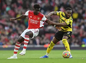 Arsenal V Watford 2021-22 Prints: Arsenal's Bukayo Saka Takes on Watford's Danny Rose in Premier League Clash