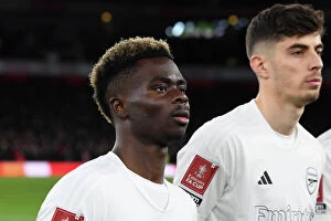 Arsenal v Liverpool FA Cup 2023-24 Collection: Arsenal's Bukayo Saka: Unwavering Focus Amidst Emirates FA Cup Battle Against Liverpool in