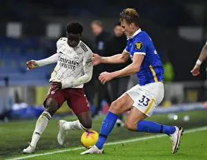 Arsenal's Bukayo Saka vs. Dan Burn: Empty Battle at American Express Community Stadium - Arsenal vs. Brighton & Hove Albion, Premier League 2020-21