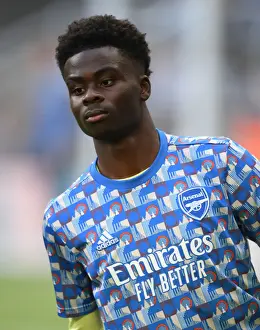 Newcastle United V Arsenal 2021-22 Prints: Arsenal's Bukayo Saka Warming Up Ahead of Newcastle United Clash in Premier League