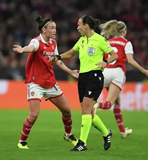 Bayern Munich V Arsenal Women 2022-23 Prints: Arsenal's Caitlin Foord Contests Referee Decision in Women's Champions League Quarter-Final vs FC Bayern Munich
