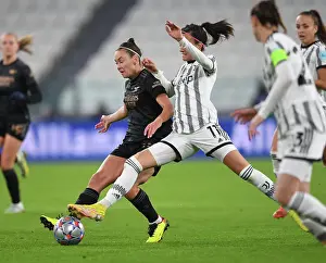 Juventus Women V Arsenal Women 2022-23 Prints: Arsenal's Caitlin Foord Fights in UEFA Women's Champions League Battle against Juventus
