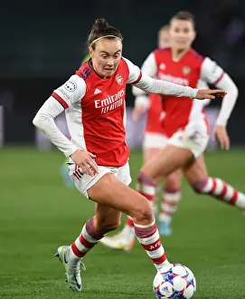 VfL Wolfsburg V Arsenal Women 2021-22 Prints: Arsenal's Caitlin Foord Fights for Victory in Champions League Quarterfinal Clash against VfL Wolfsburg