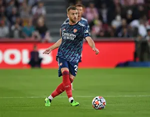 Arsenal's Calum Chambers in Action at Brentford Community Stadium