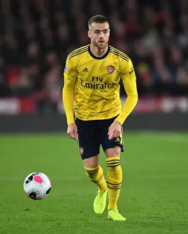 Arsenal's Calum Chambers in Action against Sheffield United - Premier League Showdown (2019-20)