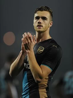 Images Dated 27th October 2015: Arsenal's Calum Chambers Celebrates Capital One Cup Victory with Fans