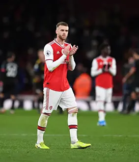 Arsenal's Calum Chambers Celebrates with Fans after Arsenal vs Manchester City, Premier League 2019-20