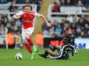Newcastle United V Arseal 2014/15 Prints: Arsenal's Calum Chambers Outmaneuvers Newcastle's Sami Ameobi in Premier League Clash