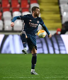 Arsenal's Calum Chambers in UEFA Europa League Quarterfinal Match against Slavia Praha in Prague (Behind Closed Doors)