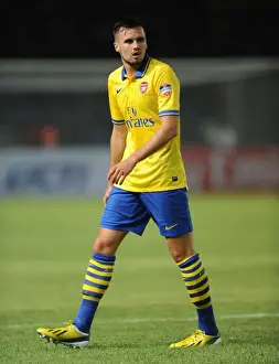 Indonesia Dream Team V Arsenal 2013-14 Prints: Arsenal's Carl Jenkinson Clashes with Indonesia All-Stars in 2013-14 Pre-Season Match