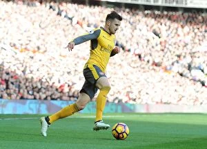 Images Dated 19th November 2016: Arsenal's Carl Jenkinson Clashes with Manchester United at Old Trafford (2016-17 Premier League)
