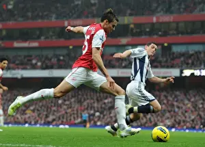 Arsenal V West Bromwich Albion 2011-12 Prints: Arsenal's Carl Jenkinson Clashes with West Brom's Graham Dorrans in Premier League Showdown