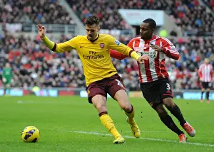 Sunderland V Arsenal 2012-13 Prints: Arsenal's Carl Jenkinson Fends Off Sunderland's Danny Rose