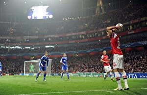 Images Dated 24th October 2012: Arsenal's Carl Jenkinson Takes a Throw-In during UEFA Champions League Match against Schalke 04