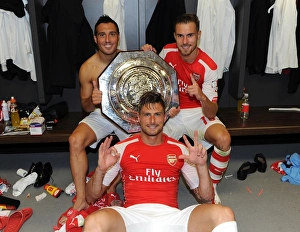 Arsenal V Manchester City - FA Community Shield 2014/15 Prints: Arsenal's Cazorla, Giroud, and Ramsey Lift the FA Community Shield after Victory over Manchester City