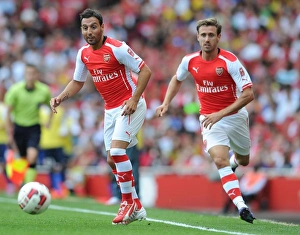 Arsenal V AS Monaco 2014-15 Prints: Arsenal's Cazorla and Monreal in Action against AS Monaco (2014-15)