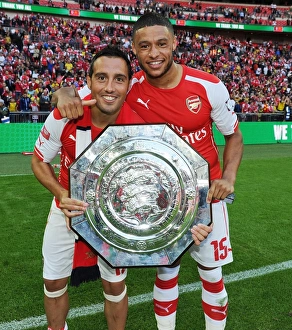 Arsenal V Manchester City - FA Community Shield 2014/15 Prints: Arsenal's Cazorla and Oxlade-Chamberlain Celebrate FA Community Shield Victory