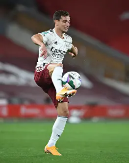 Arsenal's Cedric Faces Empty Anfield in Carabao Cup Clash Against Liverpool