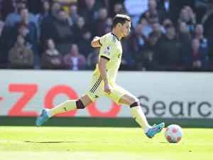 Arsenal's Cedric Faces Off Against Aston Villa in Premier League Clash