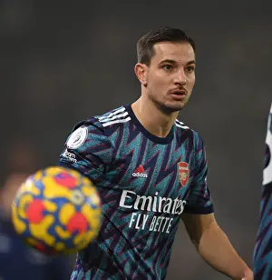Arsenal's Cedric Faces Off in Intense Premier League Clash Against Leeds United