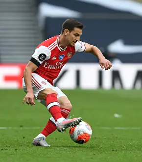 Arsenal's Cedric Faces Off Against Tottenham in Intense Premier League Rivalry