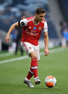Arsenal's Cedric Faces Off Against Tottenham in Premier League Clash
