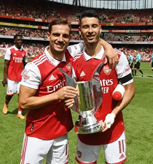 Arsenal V Sevilla - Emirates Cup 2022 Prints: Arsenal's Cedric and Gabriel Martinelli Lift Emirates Cup After Arsenal v Sevilla Friendly