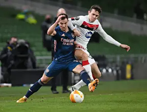 Dundalk V Arsenal 2020-21 Prints: Arsenal's Cedric Overpowers Dundalk's James Wynne in UEFA Europa League Clash