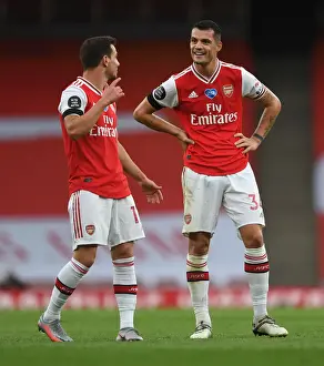 Arsenal's Cedric Soares and Granit Xhaka in Action against Norwich City (2019-20)