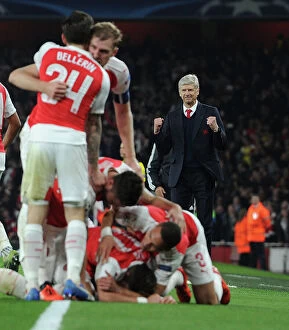 Images Dated 20th October 2015: Arsenal's Champions League Triumph: Wenger and Ozil Celebrate Second Goal Against Bayern Munich