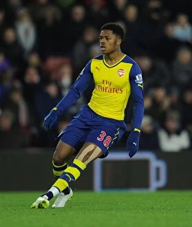 Southampton v Arsenal 2014-15 Collection: Arsenal's Chuba Akpom Faces Off Against Southampton in Premier League Clash (January 2015)