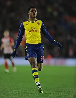 Southampton v Arsenal 2014-15 Collection: Arsenal's Chuba Akpom Goes Head-to-Head with Southampton in Premier League Showdown (January 2015)