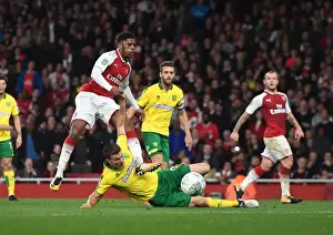 Arsenal V Norwich - Carabo Cup 4th Round 2017-18 Prints: Arsenal's Chuba Akpom Tries to Shoot Past Norwich's Christoph Zimmermann in Carabao Cup Clash