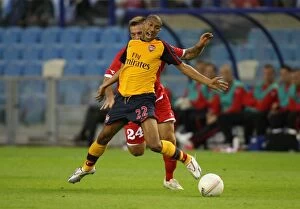 FC Twente v Arsenal Collection: Arsenal's Clichy Shines in 2-0 Champions League Victory over FC Twente's Arnautovic