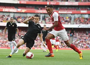 Arsenal V Seville - Emirates Cup 2017-18 Prints: Arsenal's Cohen Bramall Clashes with Sevilla's Sebastien Corchia in Emirates Cup Match