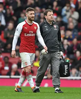 Arsenal V Watford 2017-18 Prints: Arsenal's Colin Lewin Tends to Injured Shkodran Mustafi vs. Watford (2017-18)