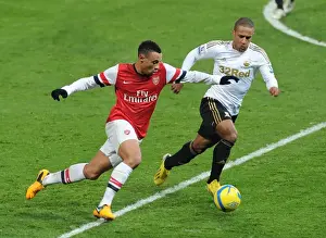 Arsenal's Coquelin Clashes with Swansea's Richards in FA Cup Third Round Replay