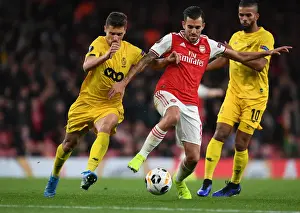 Arsenal's Dani Ceballos Clashes with Standard Liege's Aleksander Boljevic in Europa League Showdown