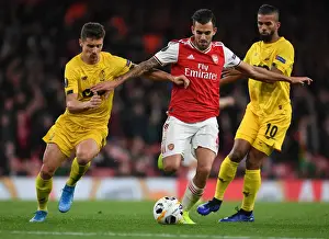Arsenal's Dani Ceballos Faces Off Against Standard Liege's Aleksander Boljevic in Europa League Clash