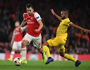 Arsenal's Dani Ceballos Outmaneuvers Standard Liege's Mehdi Carcela in Europa League Clash