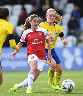 Arsenal's Danielle van de Donk Clashes with Birmingham's Sarah Mayling in WSL Action