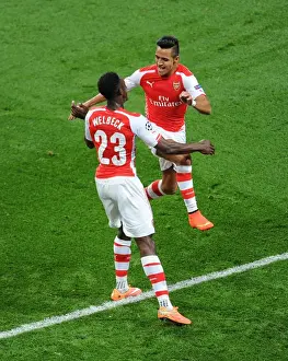 Arsenal V Galatasaray 2014/15 Champions League Prints: Arsenal's Danny Welbeck and Alexis Sanchez Celebrate Goals Against Galatasaray in 2014 Champions League