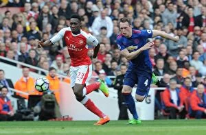 Images Dated 7th May 2017: Arsenal's Danny Welbeck Clashes with Manchester United's Phil Jones in Premier League Showdown