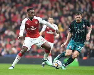 Arsenal V Southampton 2017-18 Prints: Arsenal's Danny Welbeck Clashes with Southampton's Pierre-Emile Hojbjerg in Premier League Showdown