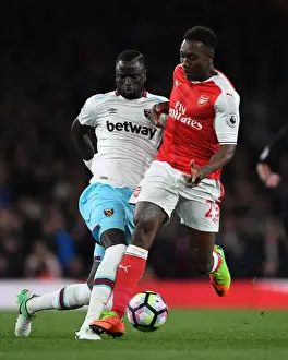 Arsenal V West Ham United 2016-17 Prints: Arsenal's Danny Welbeck Clashes with West Ham's Cheikhou Kouyate during the Premier League Match